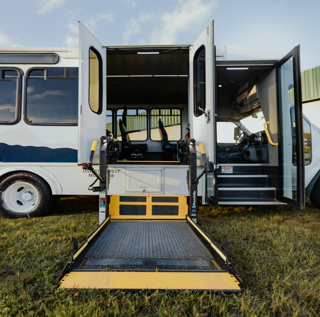 Photo of ramp lift on side of RCT shuttle bus used to lift wheelchairs