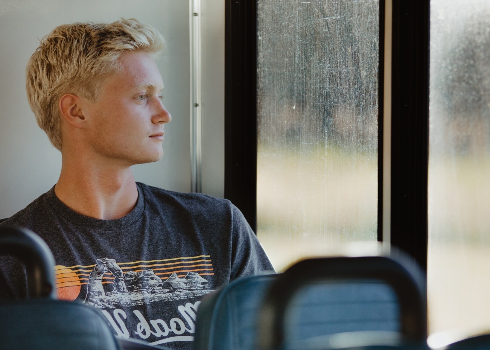 Photo of passenger looking out of bus window